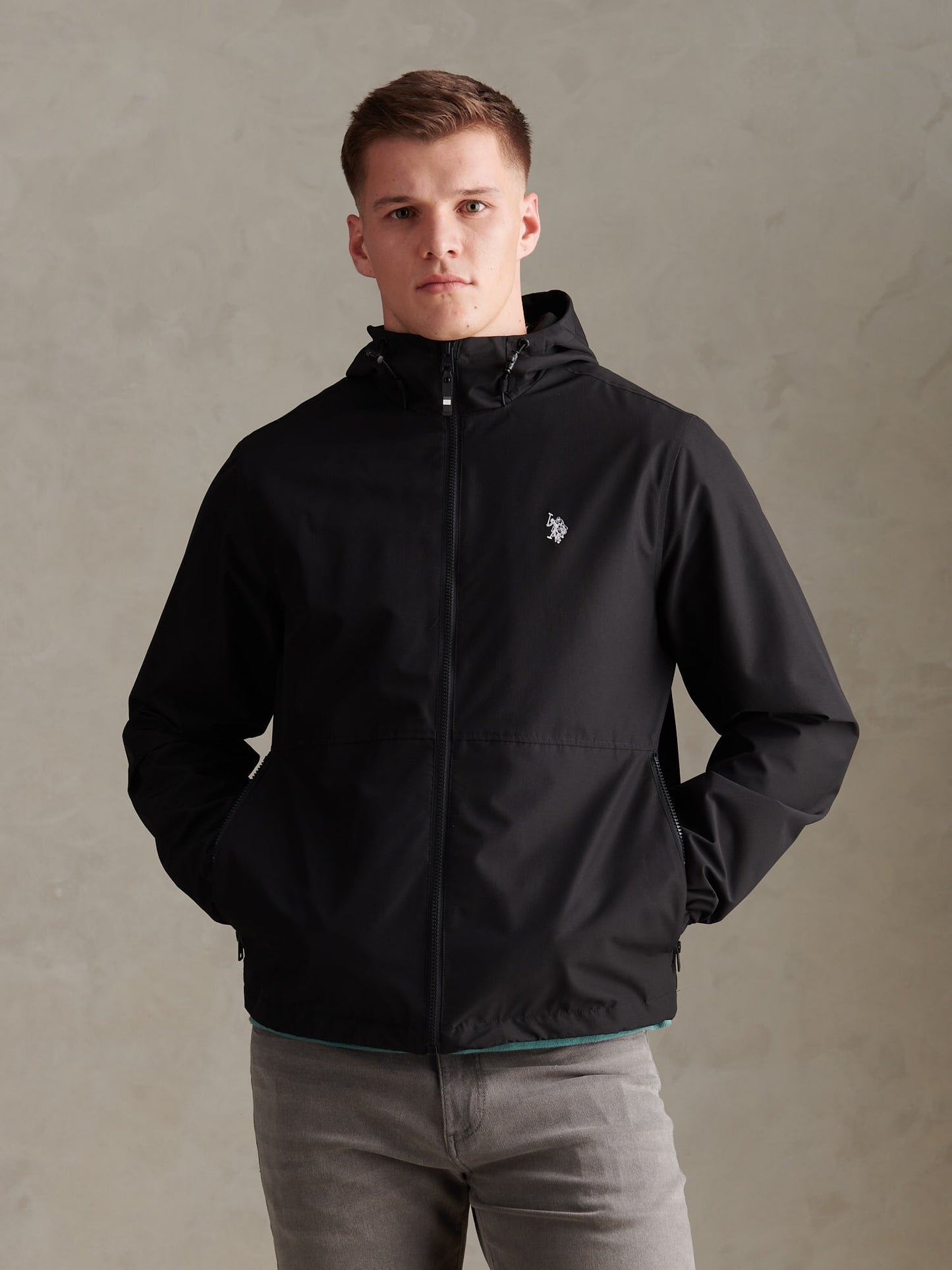 U.S. Polo Assn. Men's Hooded Windbreaker in Black/White – front view