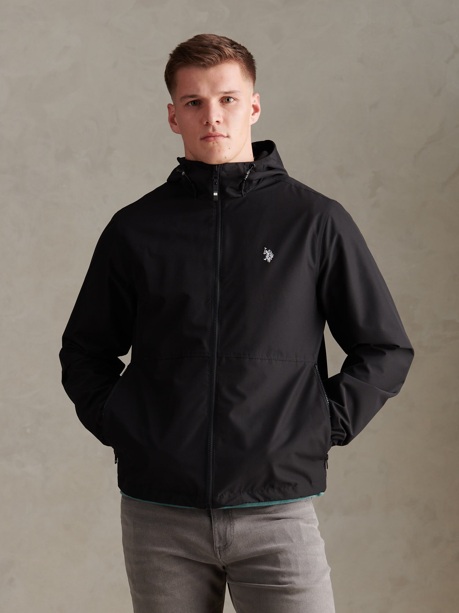 U.S. Polo Assn. Men's Hooded Windbreaker in Black/White – front view