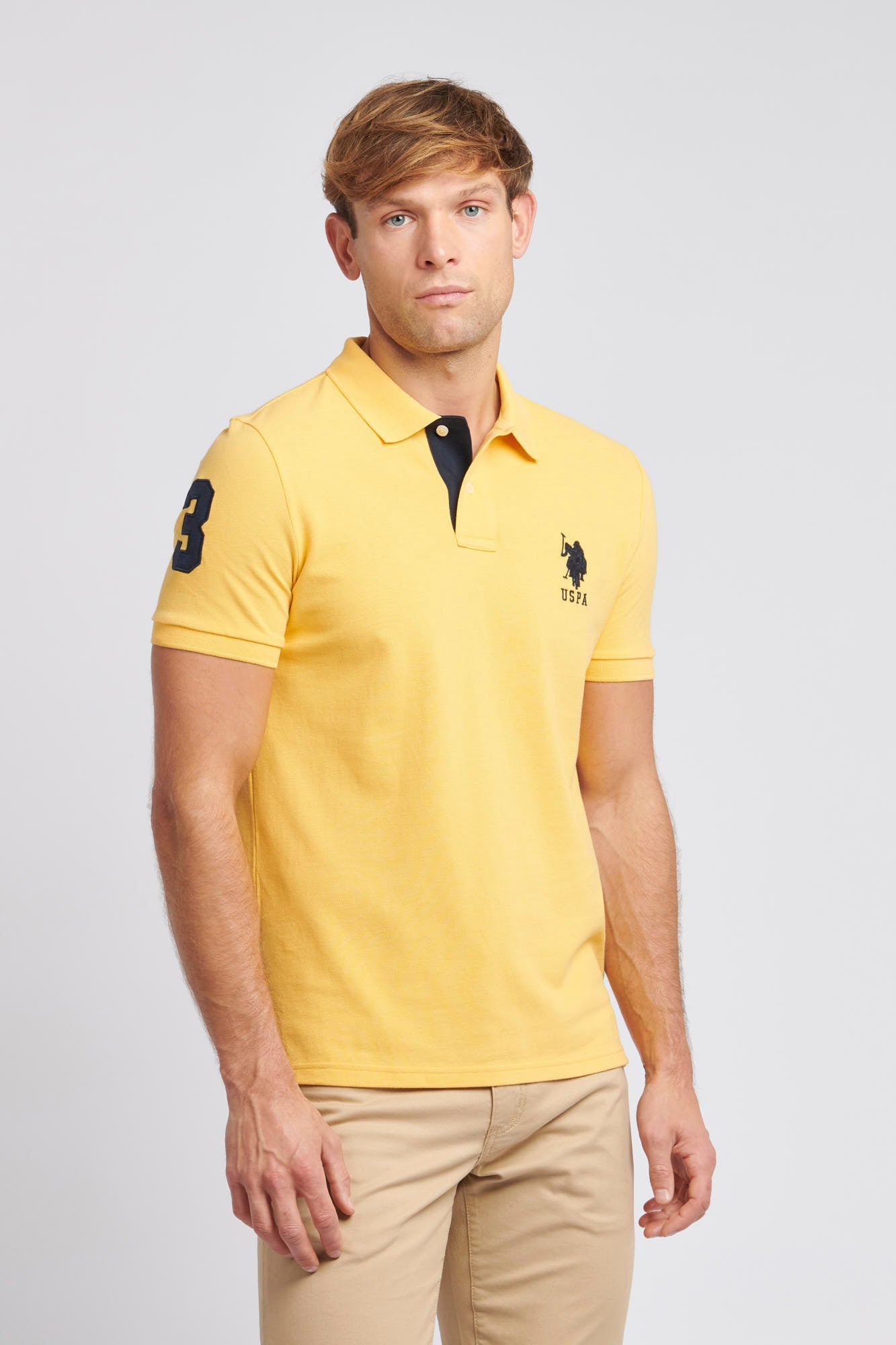 U.S. Polo Assn. Mens Player 3 Pique Polo Shirt in Sunset Gold