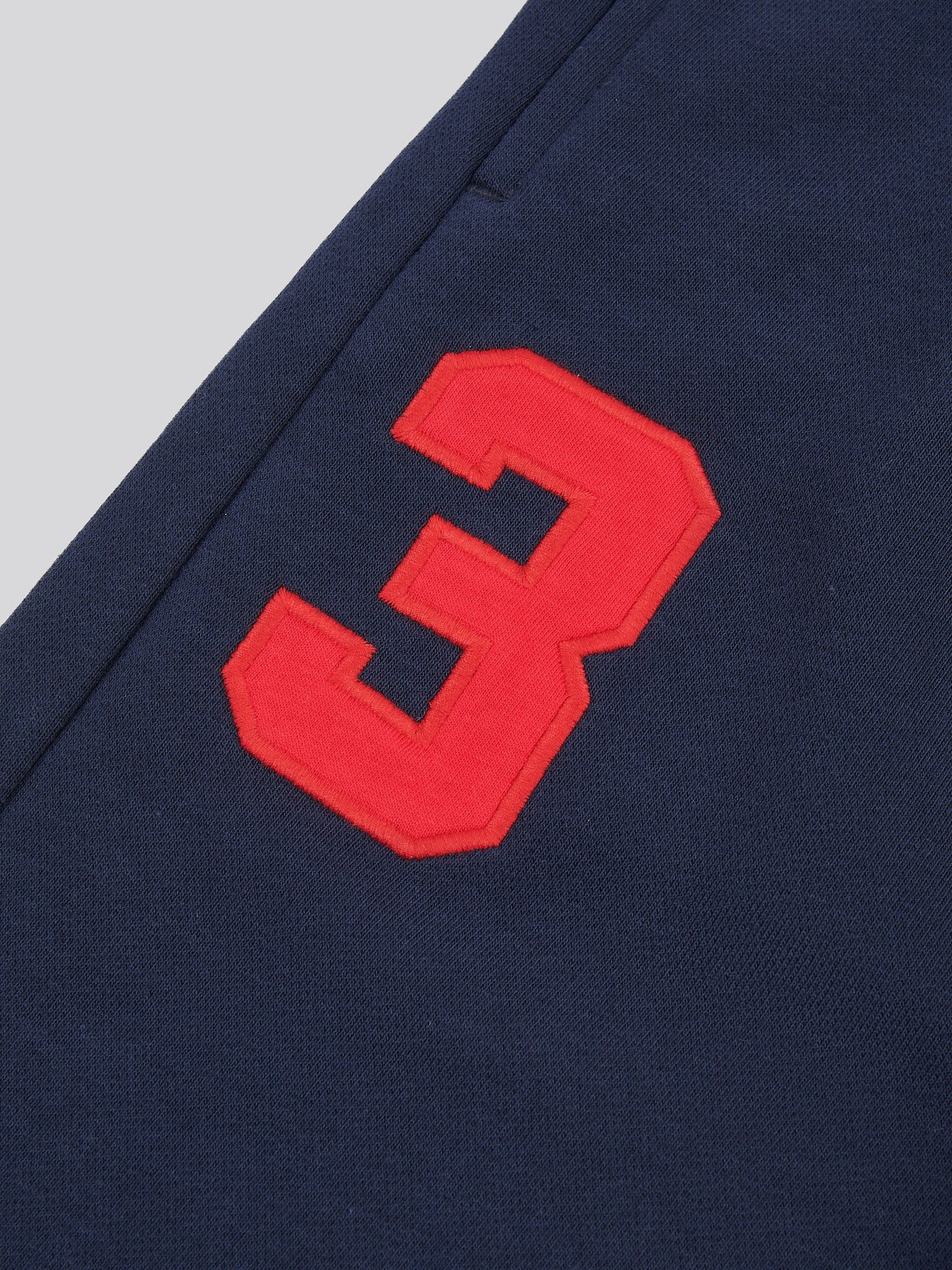 Mens Player 3 Loopback Jogger in Dark Sapphire Navy / Haute Red DHM