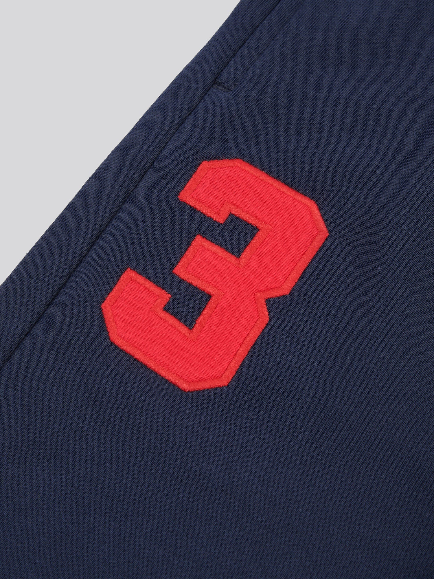 Mens Player 3 Loopback Jogger in Dark Sapphire Navy / Haute Red DHM