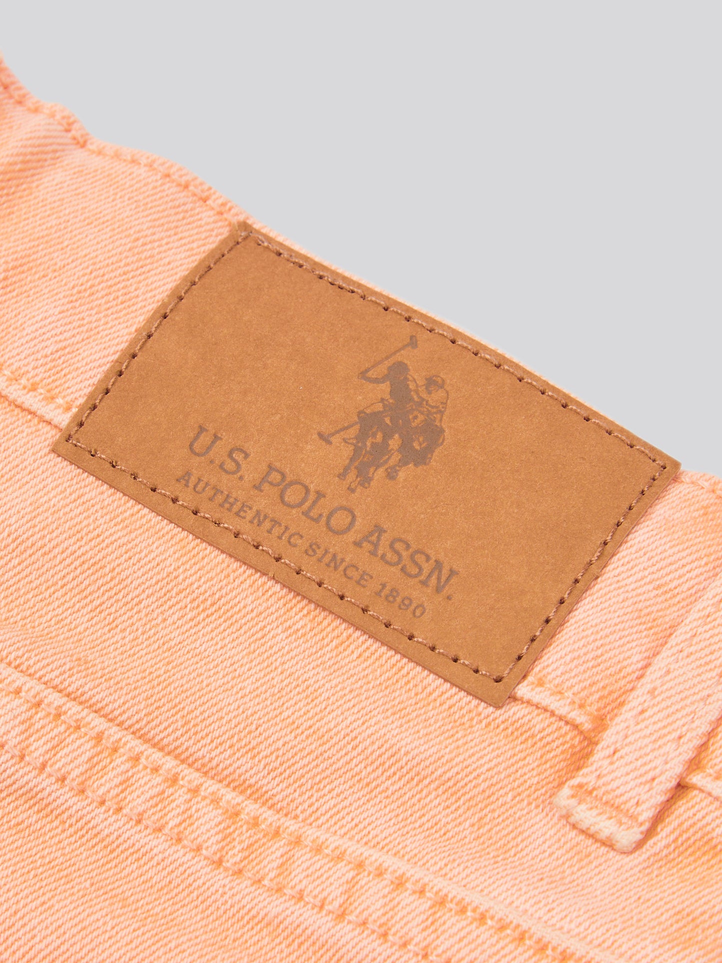 Girls Wash Denim Shorts in Peach Nectar