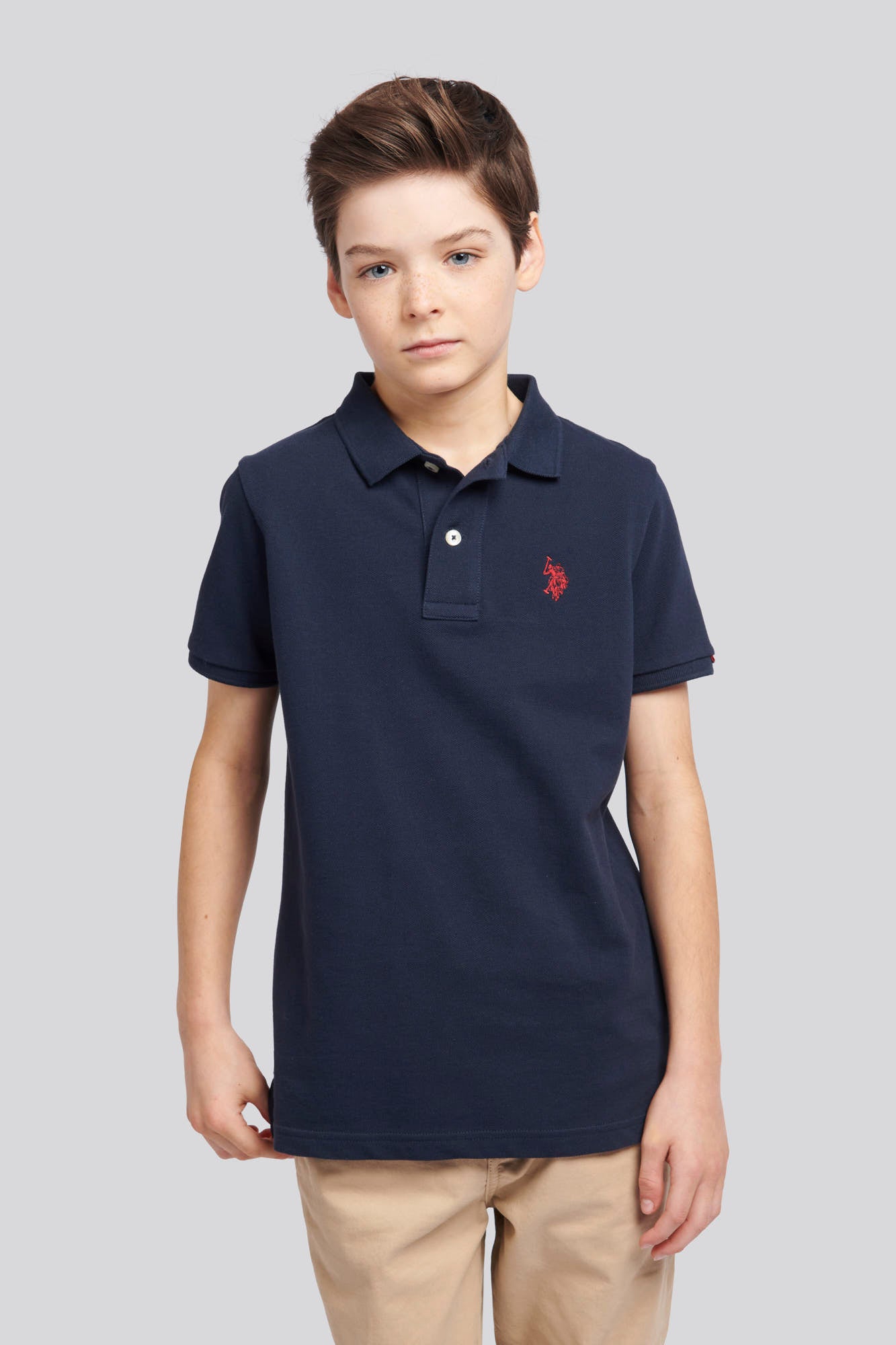 Boys Pique Polo Shirt in Dark Sapphire Navy / Haute Red DHM