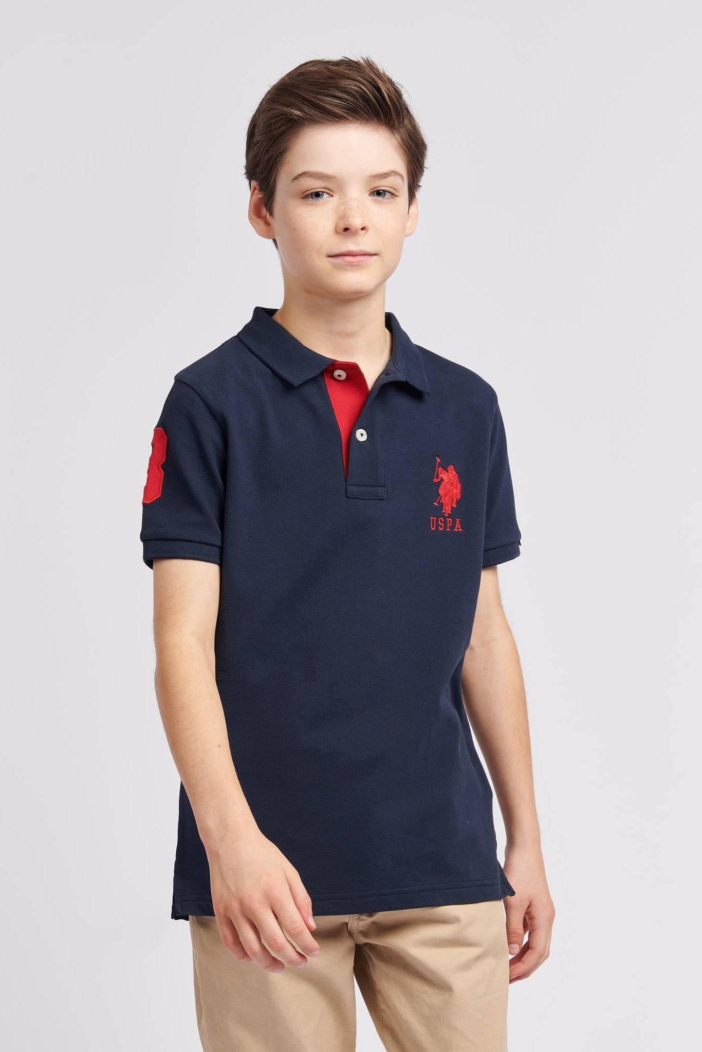 Boys Player 3 Pique Polo Shirt in Dark Sapphire Navy / Haute Red DHM