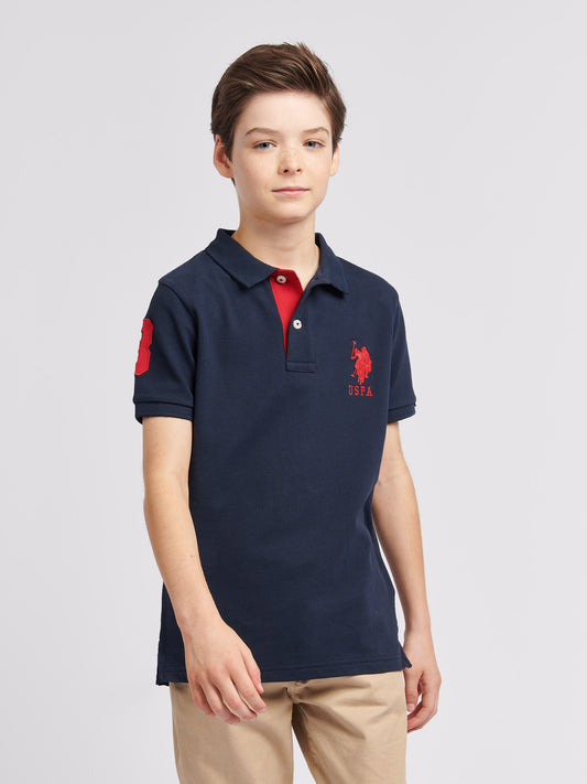 Boys Player 3 Polo Shirt in Dark Sapphire Navy / Haute Red DHM
