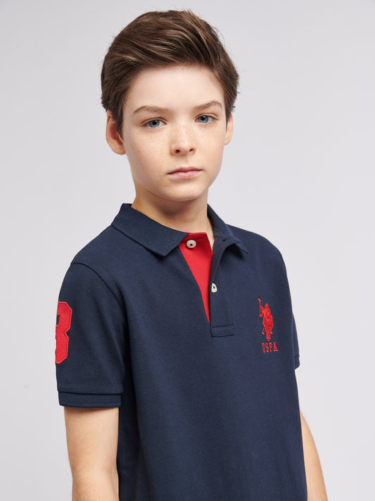 Boys Player 3 Polo Shirt in Dark Sapphire Navy / Haute Red DHM