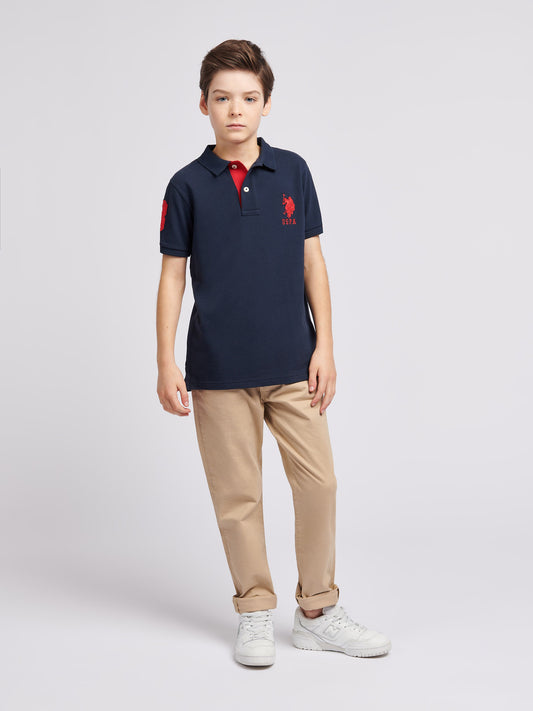 Boys Player 3 Polo Shirt in Dark Sapphire Navy / Haute Red DHM
