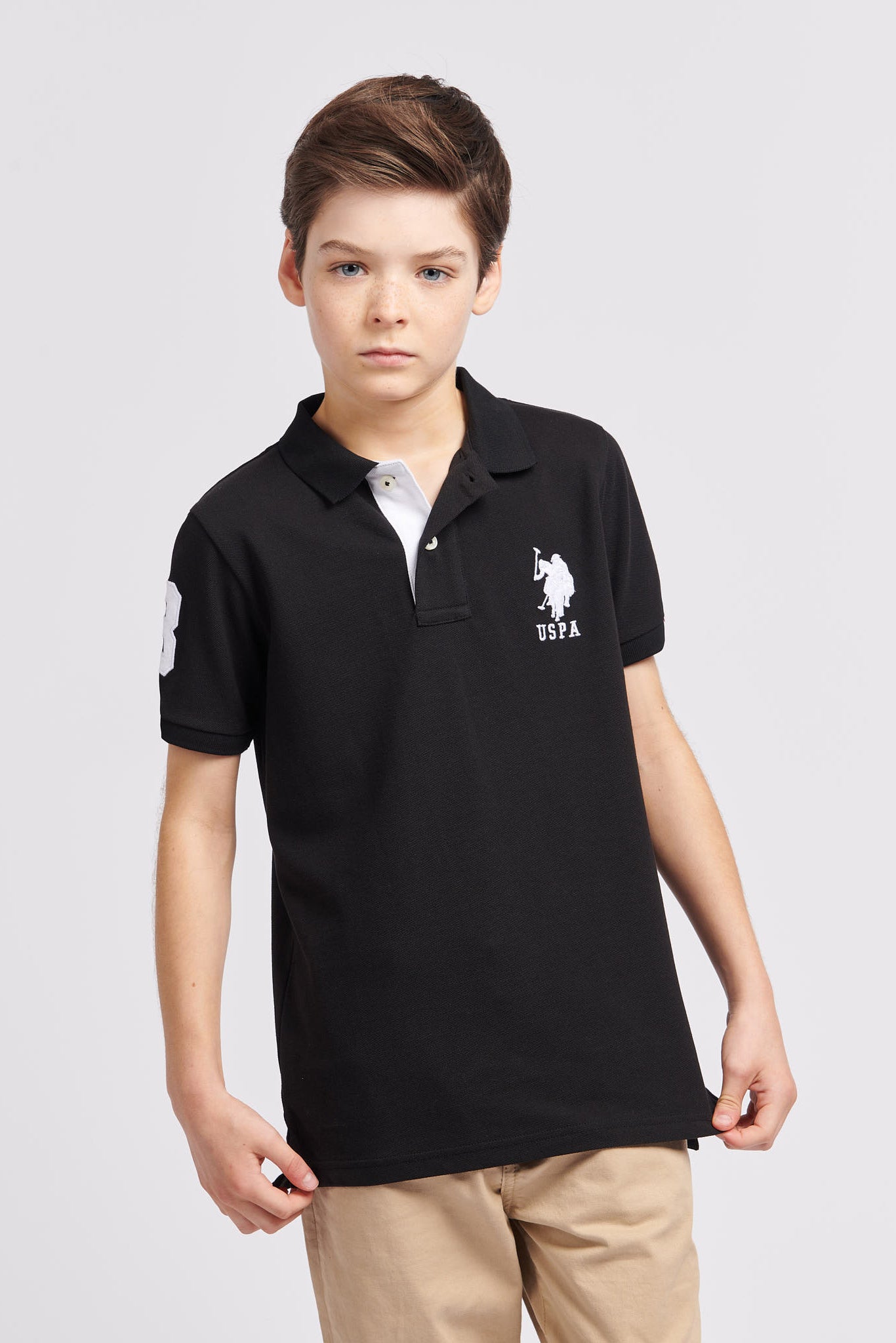 Boys Player 3 Pique Polo Shirt in Black Bright White DHM