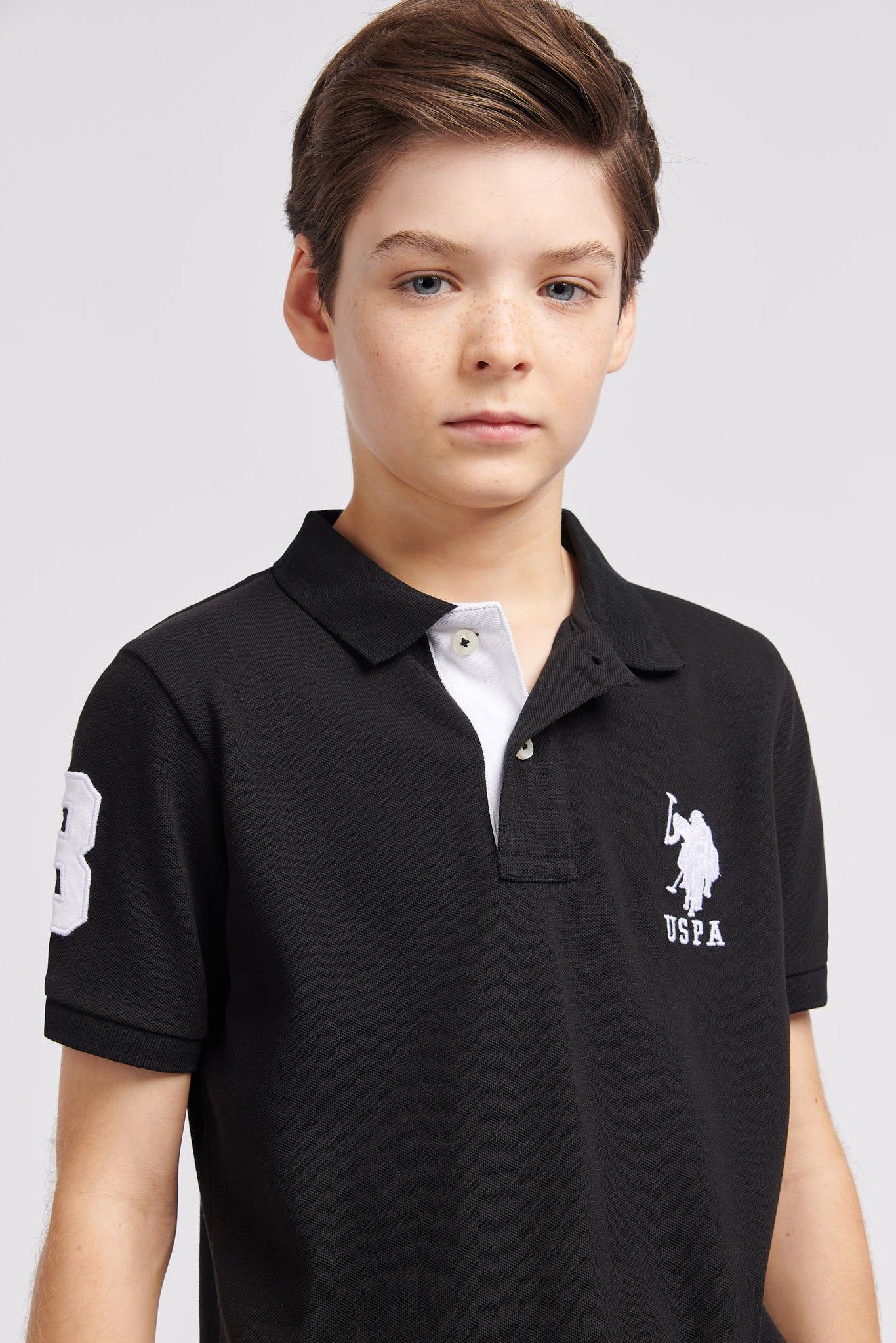 Boys Player 3 Pique Polo Shirt in Black Bright White DHM