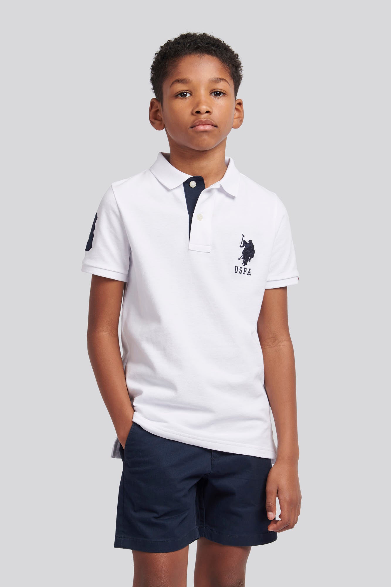 Boys Player 3 Pique Polo Shirt in White / Dark Sapphire Navy DHM