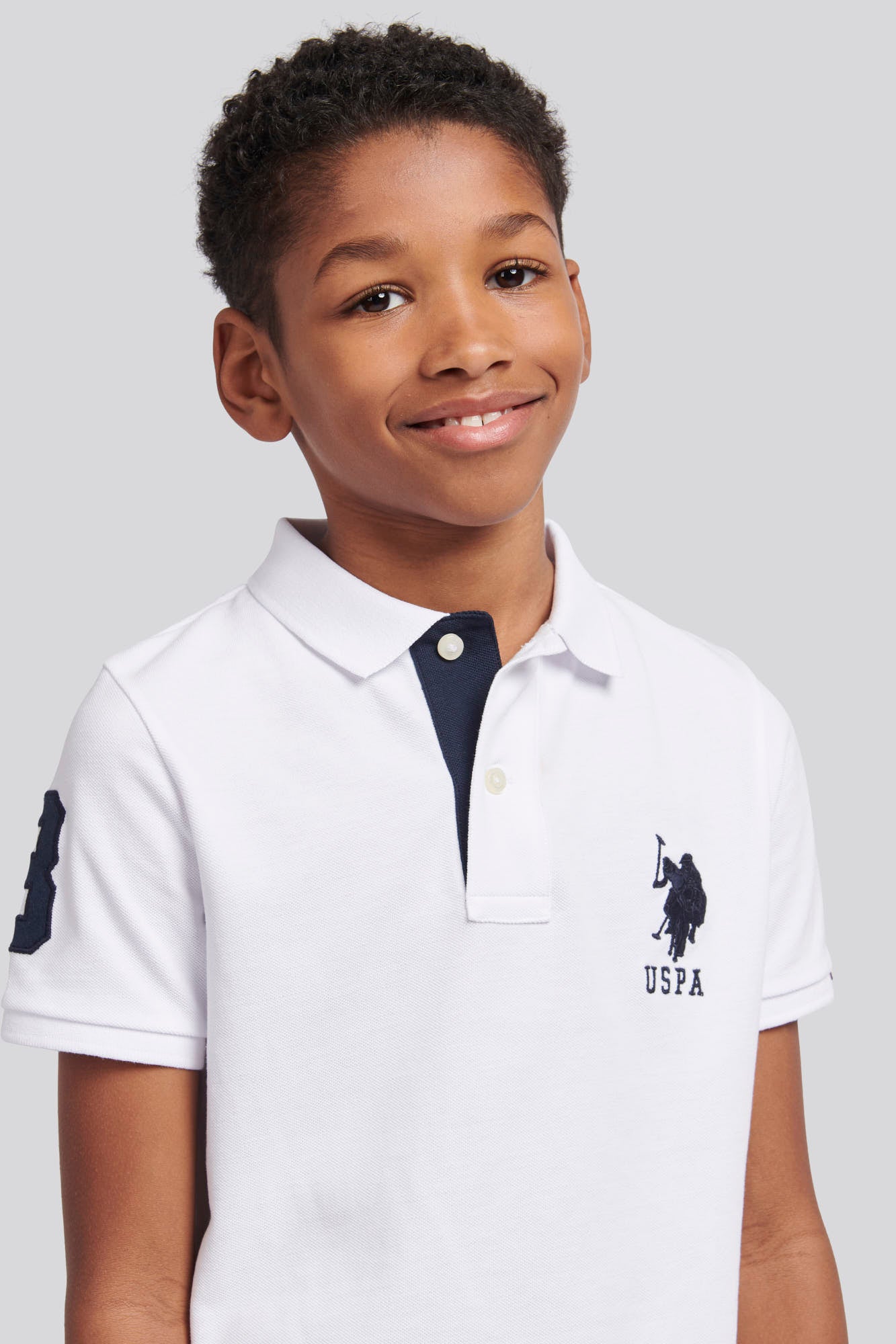 Boys Player 3 Pique Polo Shirt in White / Dark Sapphire Navy DHM