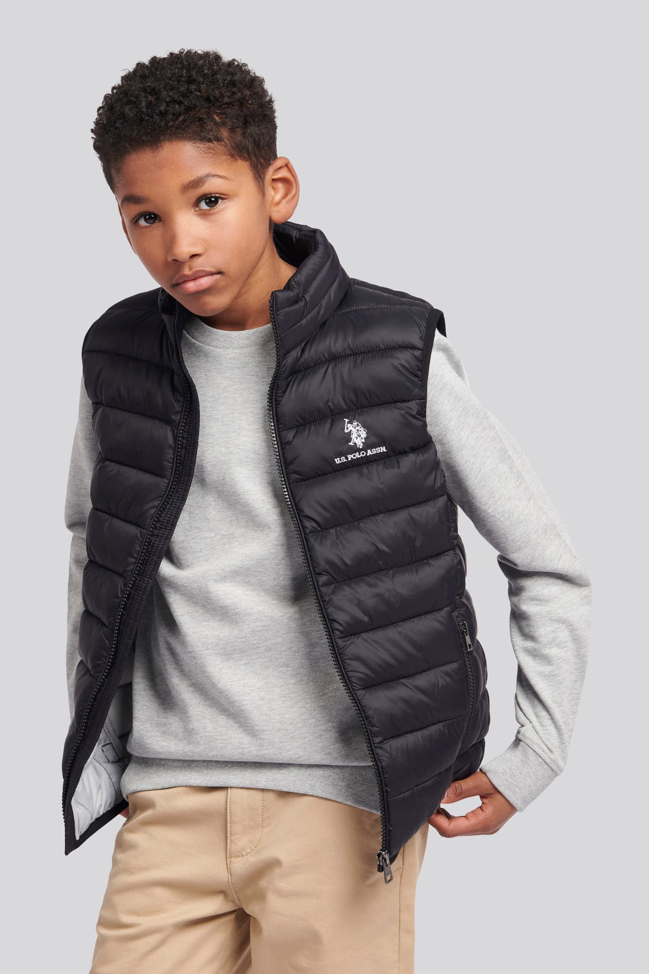 U.S. Polo Assn. Boys Bound Quilted Gilet in Black Bright White DHM
