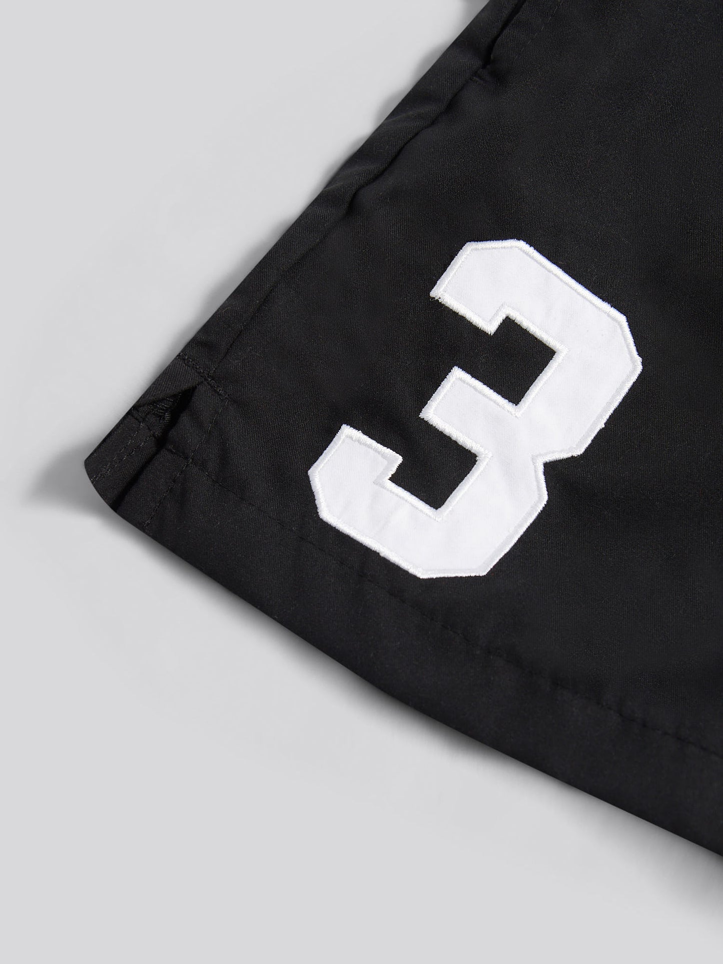 Boys Player 3 Swim Short in Black Bright White DHM