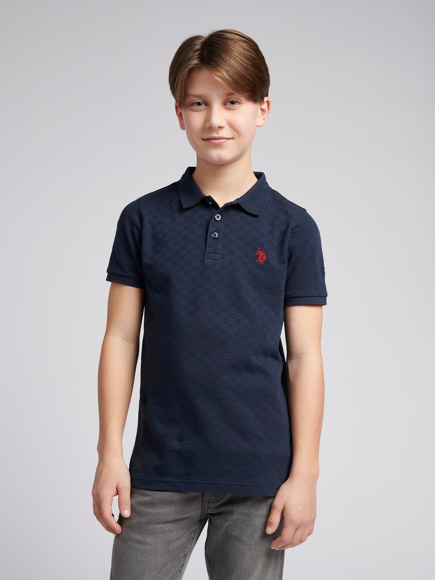 Boys Check Texture Polo Shirt in Dark Sapphire Navy / Haute Red DHM