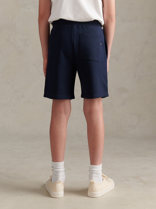 Player 3 Sweat Short Dark Sapphire Navy / Haute Red DHM