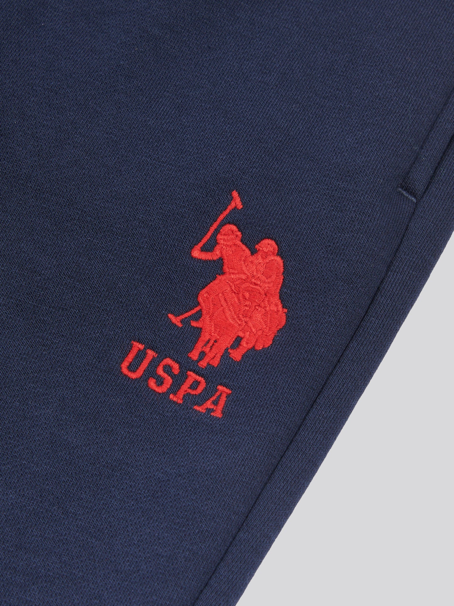 Boys Player 3 Jogger in Dark Sapphire Navy / Haute Red DHM