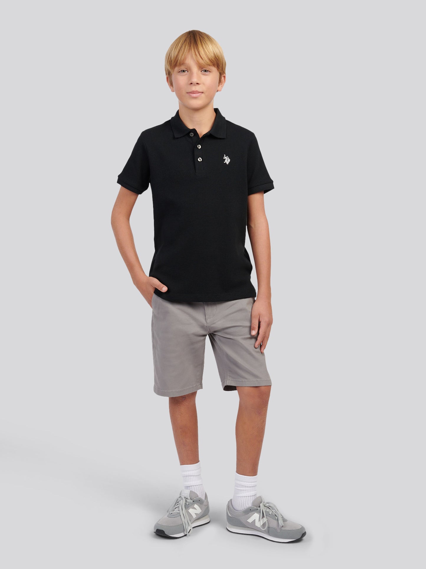 Boys Waffle Texture Polo Shirt in Black